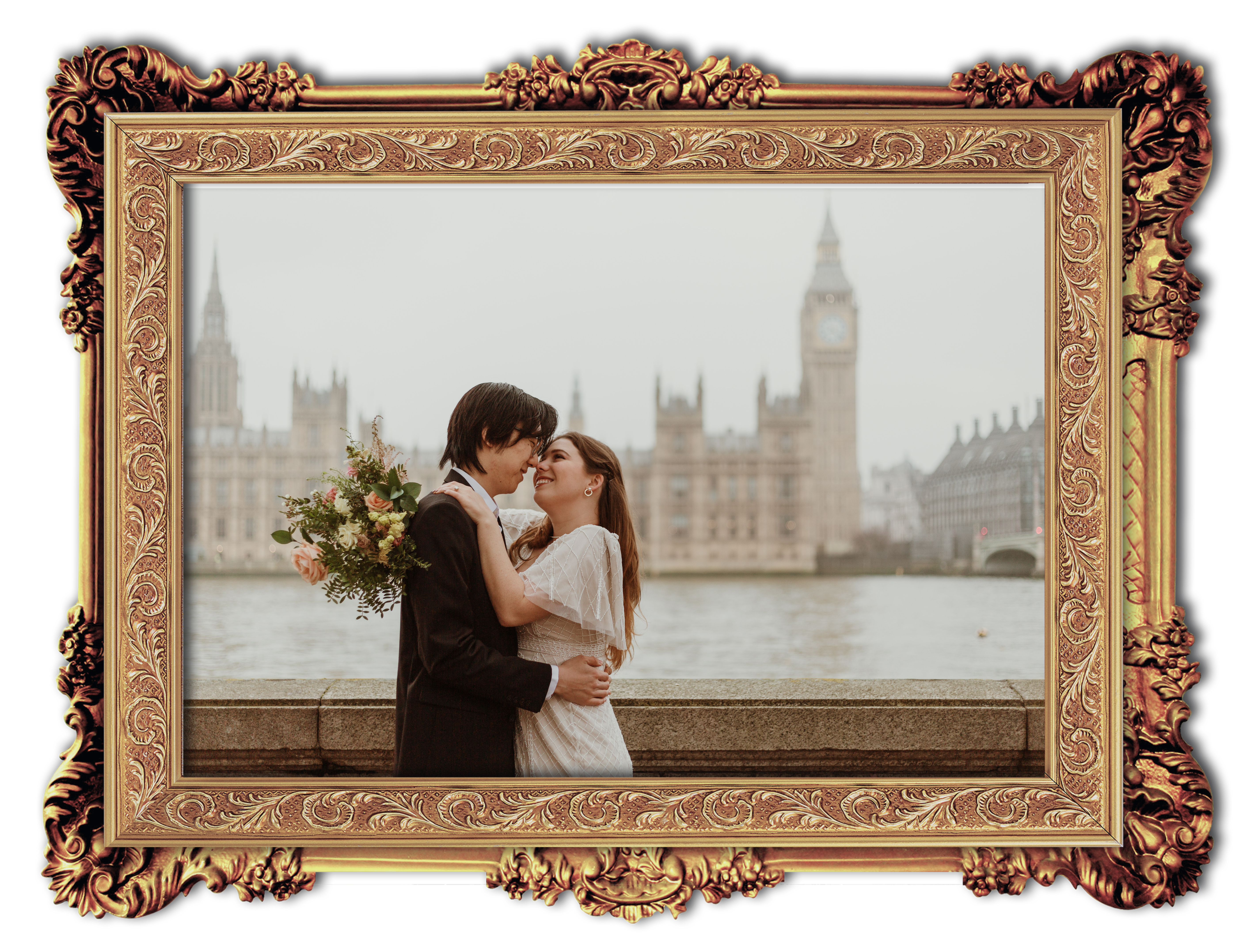 A framed picture of Joon and Annie in front of Big Ben and the River Thames.